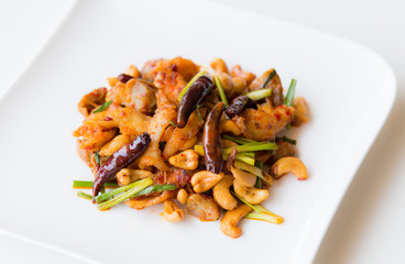 Closeup chicken with cashew nuts, rice dishes.