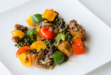 Closeup Fried fish with sweet peppers.