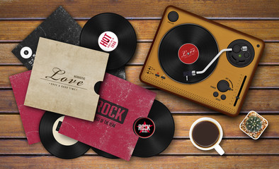 record player and vinyl record on wooden background