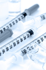 Insulin syringe with 29G. needle on white background.