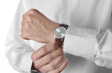 Modern watch on a businessman's wrist, close up