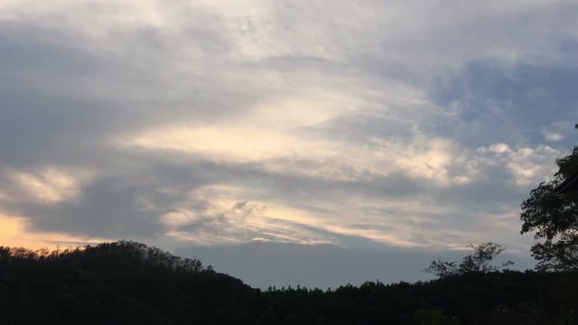 Beautiful time lapse of mountains clouds, silhouette in the morning
