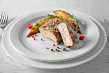 Delicious grilled steak on plate