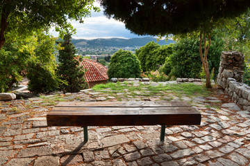 cozy corner among walls of the ancient  Old Bar, Montenegro