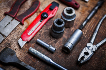 Tools on wooden plank