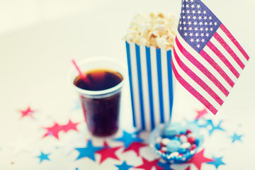 cola and popcorn with candies on independence day