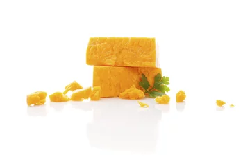 Foto op Plexiglas Delicious cheddar cheese. © Eskymaks