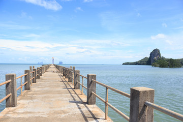 old wooden and concrete bridge in tranquil sea to find paradise destination way,Trang Thailand