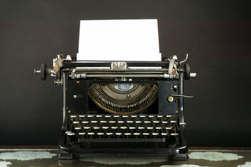 Old Typewriter with a sheet of paper