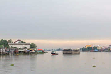 Fototapeta na wymiar landscape Tug boats chaopraya river countryside Thailand eveing time
