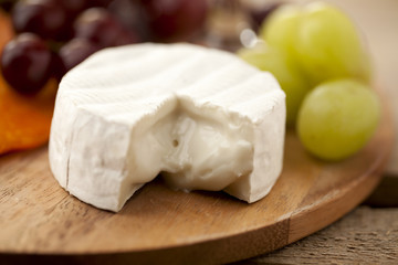 Fototapeta na wymiar cheese with grapes