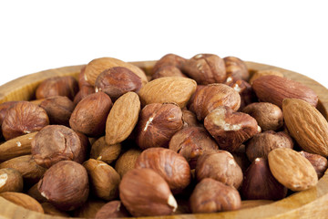 almond and walnut on wooden bowl