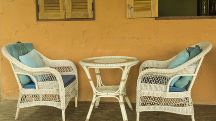 couple lovely wickerwork chair on the room