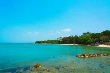 Beautiful beach with blue sea in the north of Pattaya, Thailand