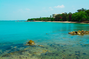 Beautiful beach with blue sea in the north of Pattaya, Thailand