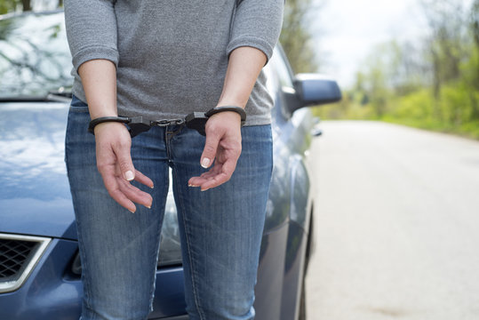 Women handcuffed criminal police