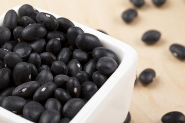 cropped image of black beans in bowl.