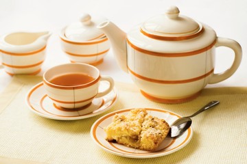 Vintage tea set with crumble pie with rhubarb