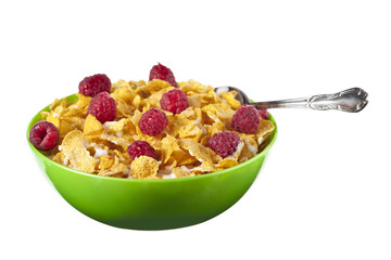 cereal and raspberries in bowl with spoon
