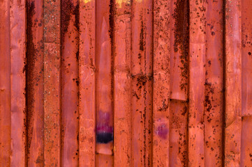 reddish rough and rusty corrugated iron metal yellow backdrop