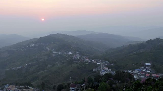 Beautiful shot sunrise at mountain village Northern ,Zoom out , Chiangrai ,Thailand 