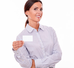 Smiling brunette businesswoman with visit card