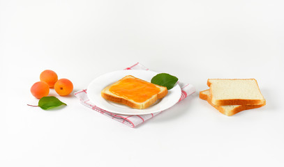 White bread with apricot jam