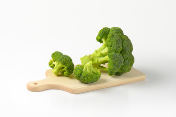 Fresh broccoli on cutting board