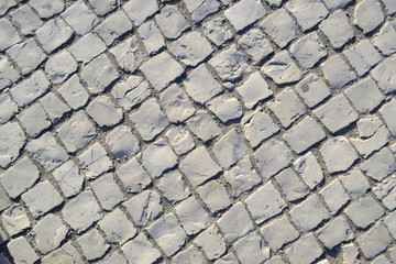 pavement floor, diagonal lines,