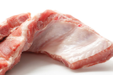 Close up of Raw Pork Ribs Isolated On White Background