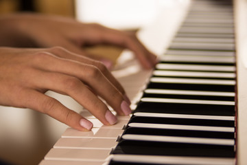 Fototapeta premium hands playing the piano