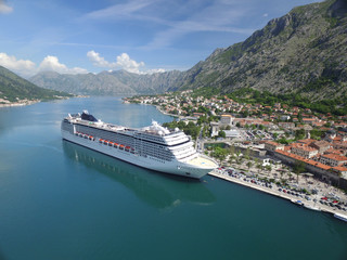 Aerial view of large cruise ship near the pier 