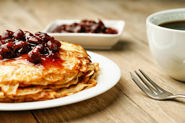 Pancakes, jam and coffee