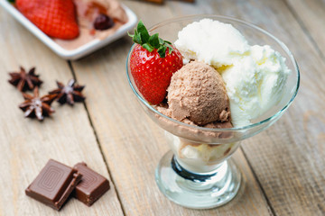 Ice cream sundae, chocolate and strawberry