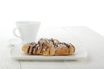 chocolate croissant with coffee