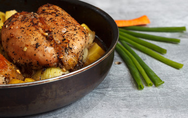 Raw chicken meat in marinade in frying pan ready for cooking