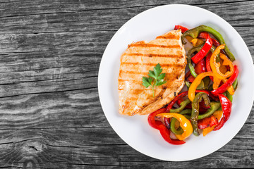 Grilled Chicken breast fillet and fried bell pepper , top view