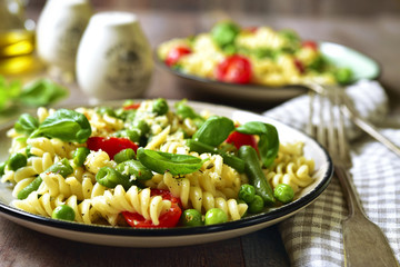 Pasta primavera on a vintage plates.