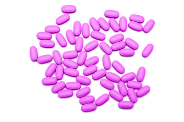 pink pills on white