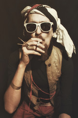 Young man wearing a stylish sunglasses