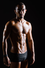 Fototapeta na wymiar Ripped muscular man in sports concept