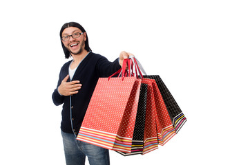 Young man holding plastic bags isolated on white