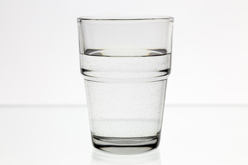 Clear glass of water isolated on white