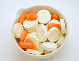 White and orange tablets