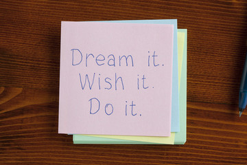 Dream it wish it do it  written on note