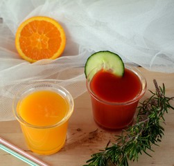 Healthy fresh orange and tomato smoothie.