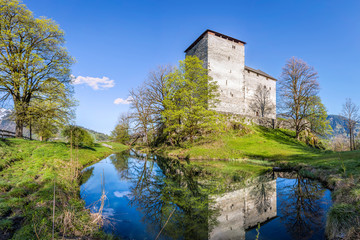 Fototapeta premium Old medieval castle with moat, Kaprun, Austria