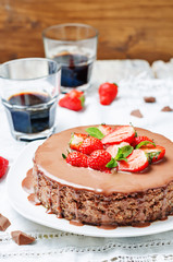milk chocolate cheesecake with milk chocolate icing and strawber