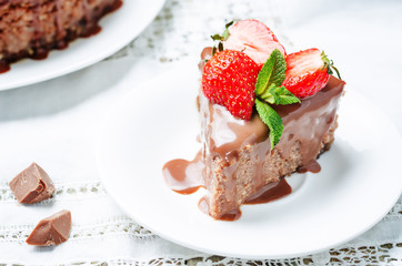 milk chocolate cheesecake with milk chocolate icing and strawber