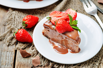 milk chocolate cheesecake with milk chocolate icing and strawber